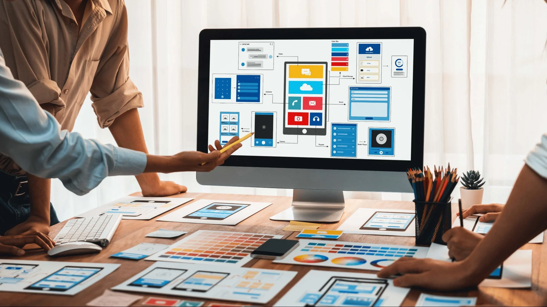 mobile app development team designing mobile application
